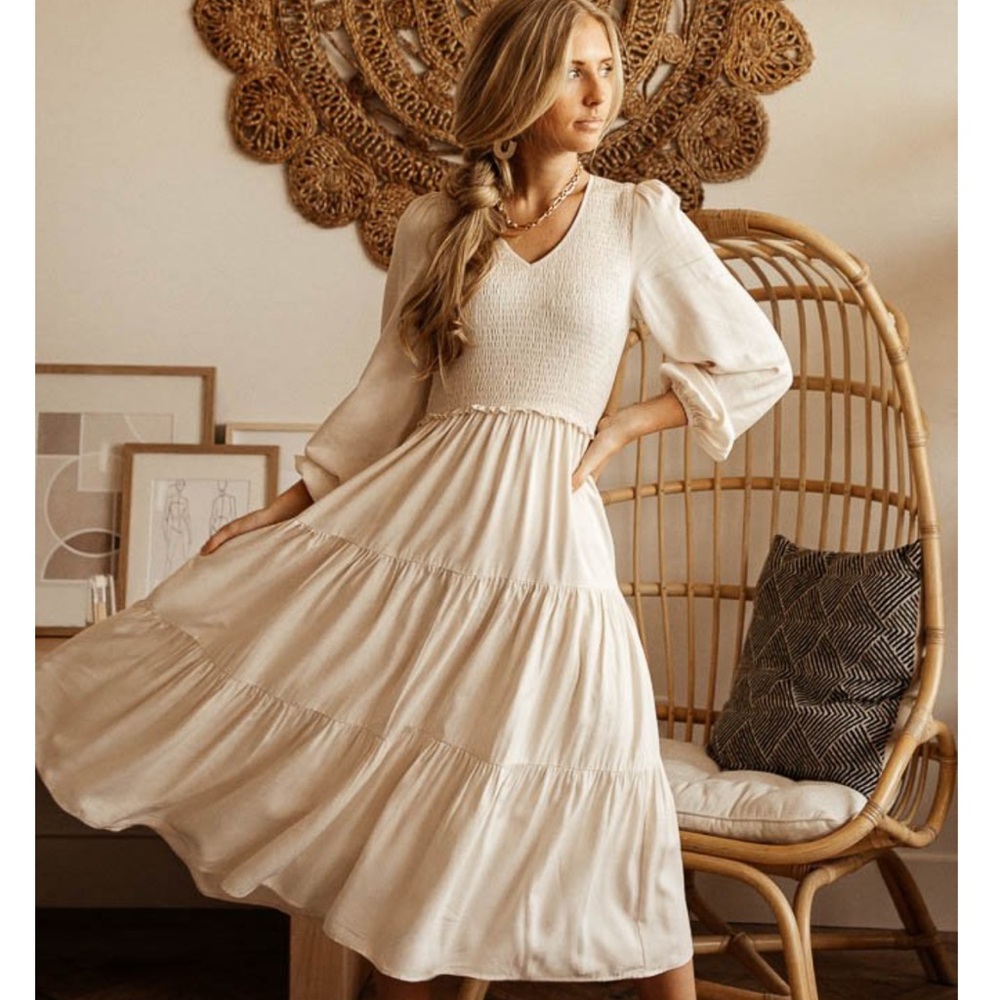 SMOCKED TIERED MIDI DRESS IN IVORY